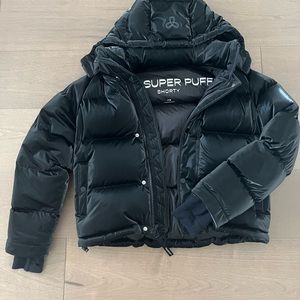 TNA the super Puff shorty in XS black (liquid Shine )